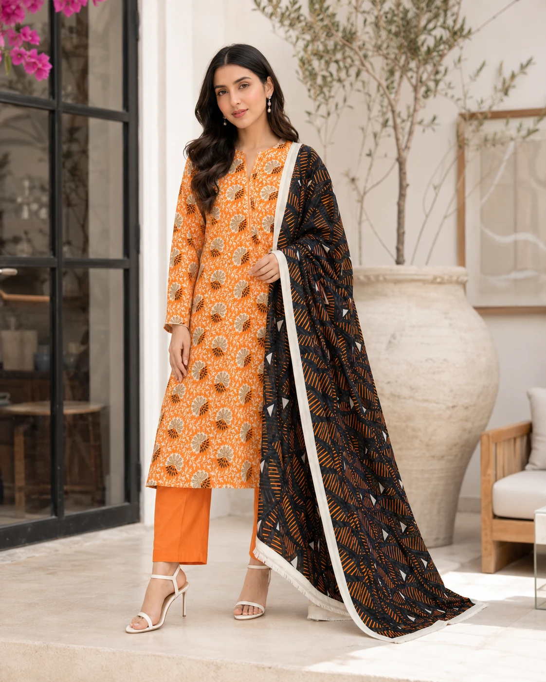 Khulda Orange Printed 3-Piece Suit with Black Geometric Dupatta